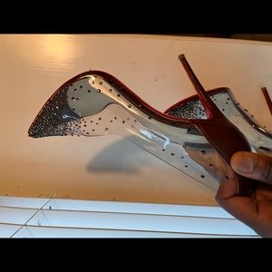 CHRISTIAN LOUBOUTIN
Degrastrass embellished PVC pumps in size 41